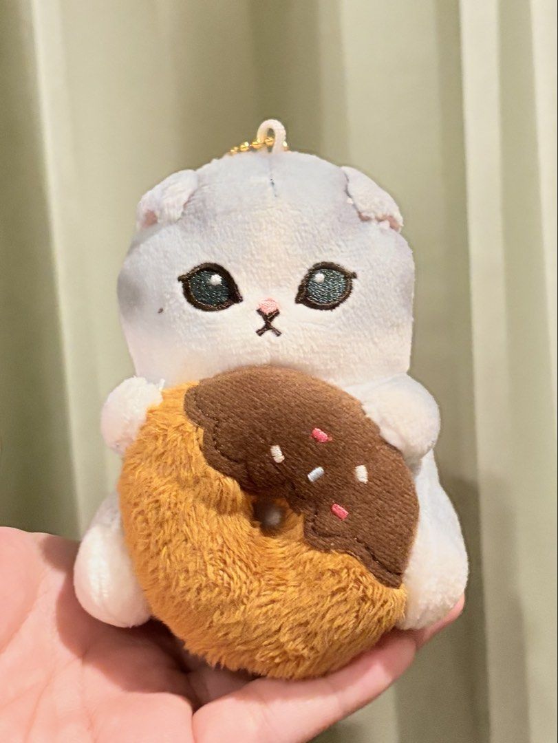 Mofusand Cat Holding Donut Plush Keychain (Category: Plushies & Soft Toys) located in Caloocan City. Submitted by miffuph (Listing ID 1465127426, Image 2). Description: .