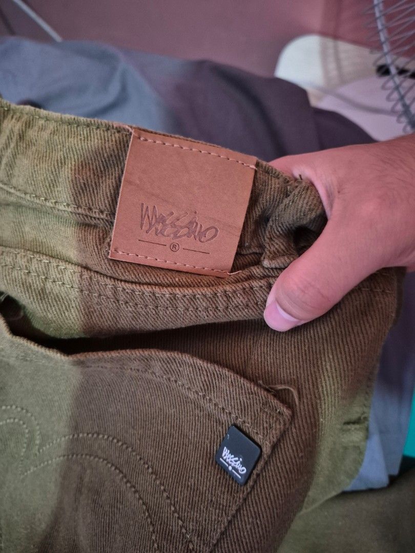 Mossimo Olive Green Denim Jeans (Category: Jeans) located in Bulacan. Submitted by mrk_mdl (Listing ID 1465164030, Image 2). Description: - Brand: Mossimo - Style: Straight leg denim jeans - Color: Olive green - Size: W30 - Material: 100% cotton - Closure: Classic button fly with metal hardware - Details: Branded leather patch on back waistband and black logo tab on rear pocket - Condition: Pre-loved / well-maintained - ankle length.