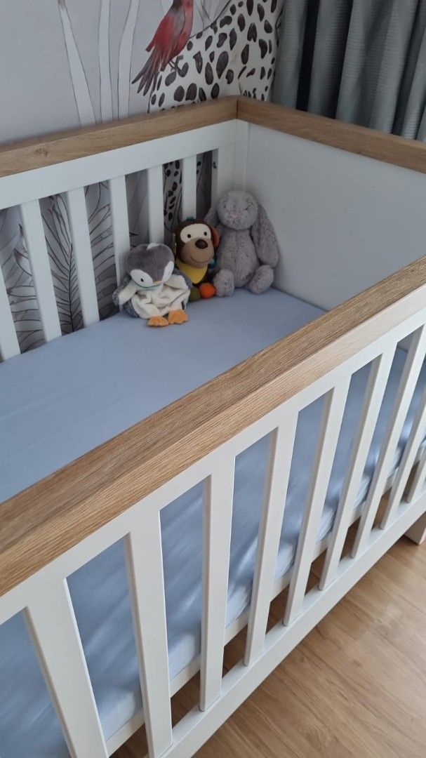 Mothercare Lulworth Cot Bed - White (Category: Cots & Cribs) located in Pasig City. Submitted by pepperoo (Listing ID 1465003917, Image 3). Description: - Brand: Mothercare Lulworth Cot Bed - Color: White and natural wood finish - Feature: Converts easily from a cot into a toddler bed - Includes: Sturdy wooden slats - Condition: Clean, from a smoke-free home - Note: Mattress and cover to be given away for free - Fulfillment: Pick up only SRP: 270