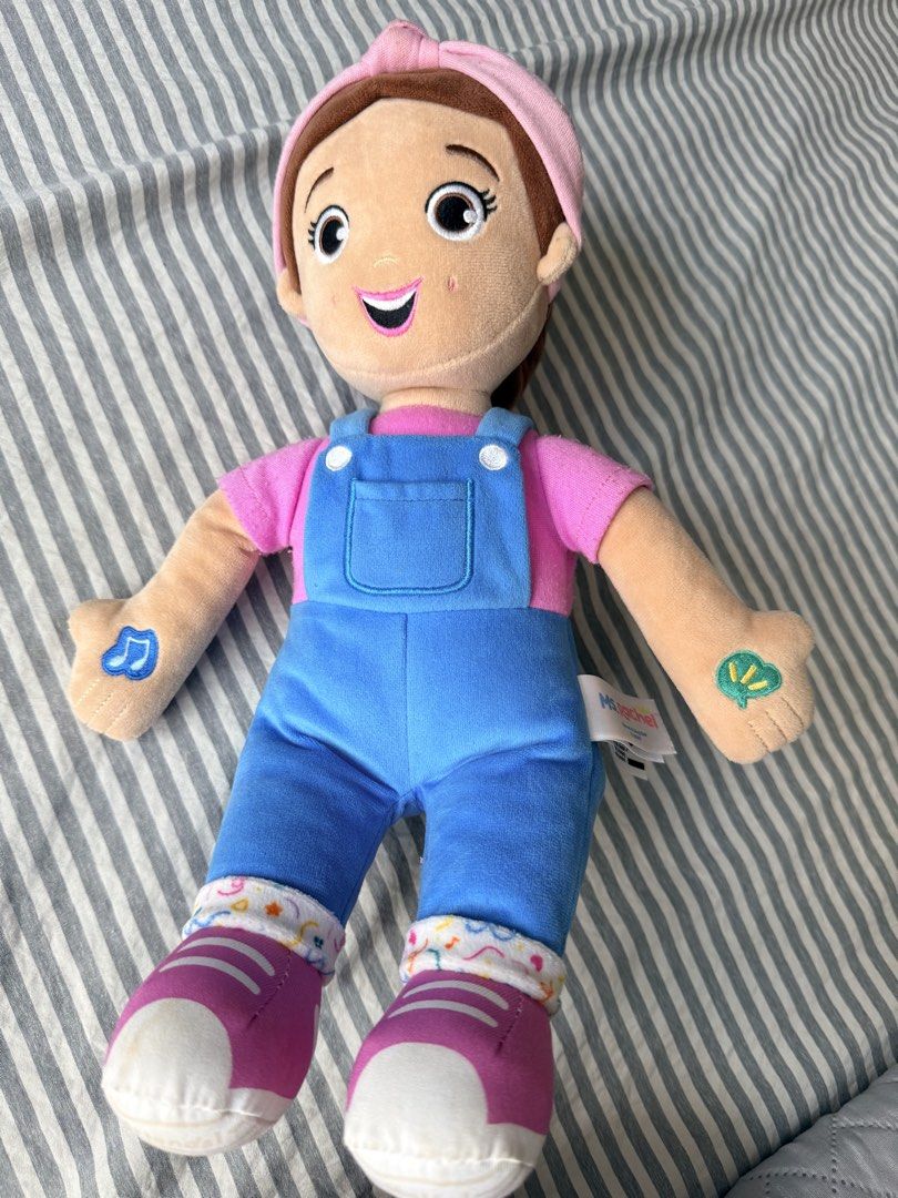Ms. Rachel Speak & Sing Doll (Category: Plushies & Soft Toys) located in Quezon City. Submitted by orinds (Listing ID 1464978181, Image 2). Description: - Authentic Ms. Rachel Speak & Sing Doll - Soft and cuddly plush material with embroidered facial features and hand symbols - Wears her classic pink shirt, blue overalls, and pink sneakers with patterned cuffs - Includes original tag (Item No. T.23507) - Clean condition with gentle signs of previ