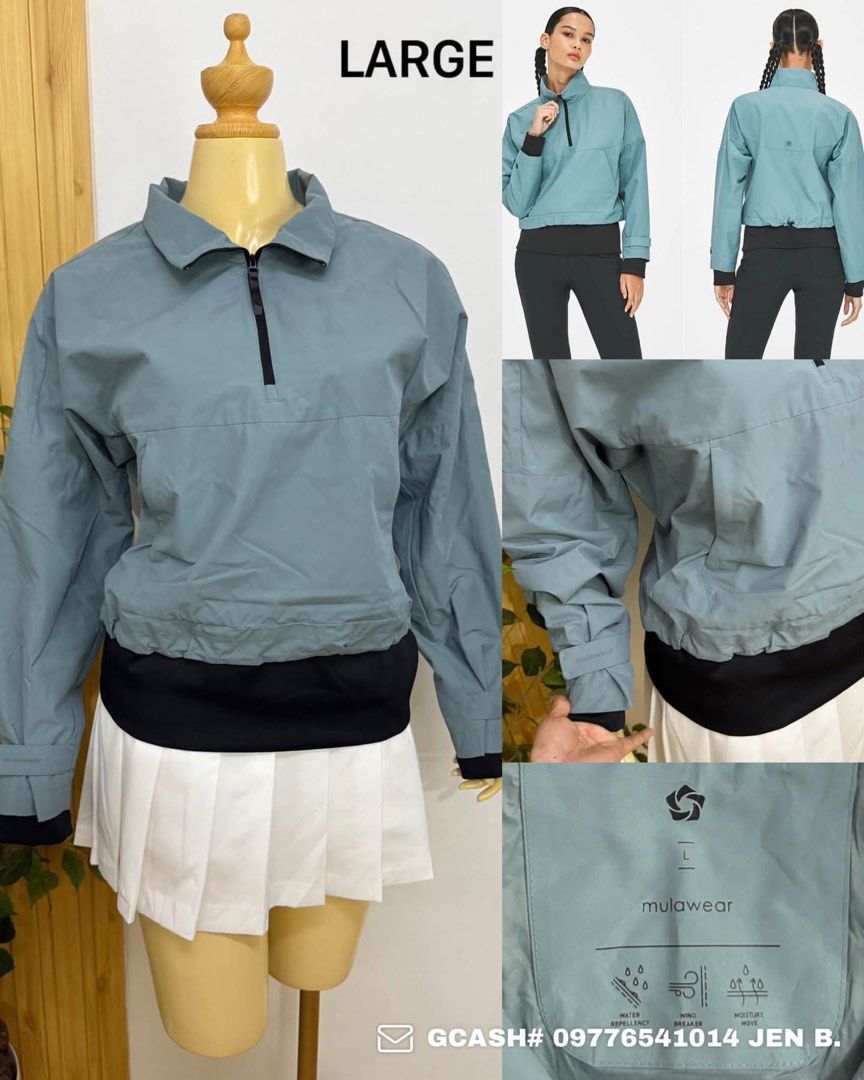 Mulawear Blue Green Windbreaker Jacket Size Large (Category: Coats, Jackets and Outerwear) located in Tagum. Submitted by bernardino49694 (Listing ID 1465010053, Image 1). Description: - Brand: Mulawear - Color: Blue-green - Size: Large (fits standard frames) - Style: Quarter zip with high collar and minimalist chest logo - Features: Water-repellent, windbreaker, and moisture-moving technical fabric - Details: Elastic black contrast hem and cuffs