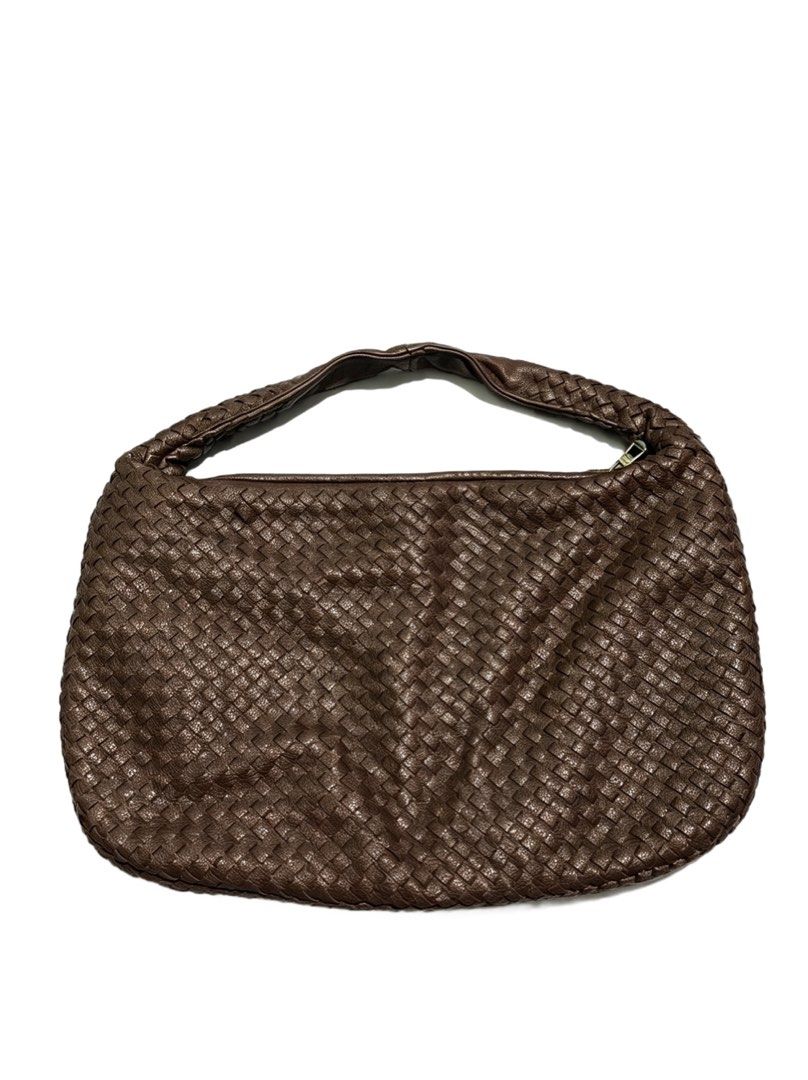 Mumu Select Brown Woven Leather Shoulder Bag (Category: Shoulder Bags) located in Quezon City. Submitted by un0oo (Listing ID 1465013806, Image 2). Description: - Authentic rich brown leather with iconic intrecciato woven pattern - Comfortable short strap designed for easy shoulder wear - Secure top zip closure to keep your belongings safe - Classic slouchy silhouette for effortless everyday style - Spacious main compartment with plenty of room f