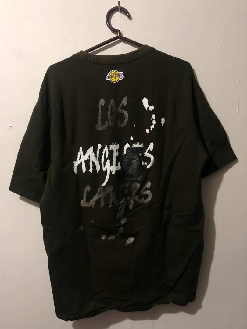 NBA Lakers Olive Green Shirt (Category: Tshirts & Polo Shirts ) located in Pasig City. Submitted by geloangelo17550 (Listing ID 1465152216, Image 1). Description: Authentic Excellent condition issue check last 2 pictures.