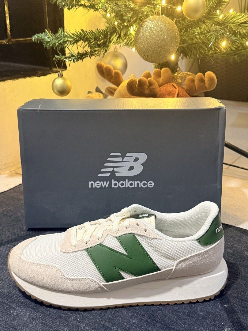 New Balance 237 Green White Sneakers (Category: Sneakers & Footwear) located in Caloocan City. Submitted by aylwander (Listing ID 1465110201, Image 2). Description: - Brand: New Balance - Model: New Balance 237 MS237WG - Colorway: White and Green - Size: 10.5 US - Materials: Premium suede and mesh upper - Features: Iconic oversized N logo, comfortable white midsole, and durable gum rubber outsole - Condition: Pristine condition with zero wear on 