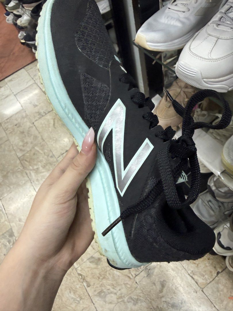 New Balance Flash Running Shoes Black Mint (Category: Sneakers) located in Manila. Submitted by fastlion.584bdf (Listing ID 1465072025, Image 3). Description: - Brand: New Balance running shoes - Color: Black and light mint green - Size: Standard fit - Upper: Textured mesh for breathability - Cushioning: DynaSoft midsole for runs and gym sessions - Closure: Standard lace-up front - Condition: Traction pattern on the sole shows some wear.