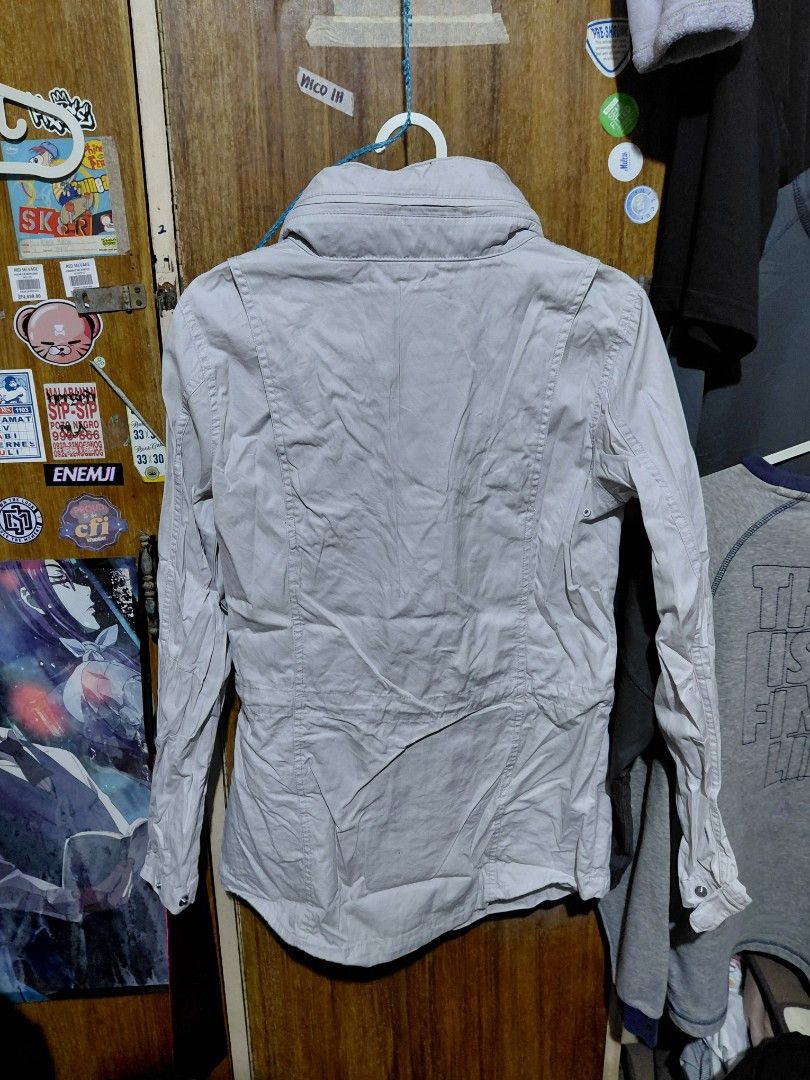 Nike 6.0 Jacket (Category: Coats, Jackets and Outerwear) located in Imus. Submitted by frootiloots4103 (Listing ID 1464988190, Image 3). Description: - Size: M (tag on collar) - Color: Light grey - Design: Multiple front pockets, zipper closure, and embroidered chest logo - Material: Breathable inner mesh lining - Origin: Made in Hong Kong - Perfect lightweight outerwear for layering in cooler weather OPEN FOR NEGO (best if aspack) 📍Imus, Cavite