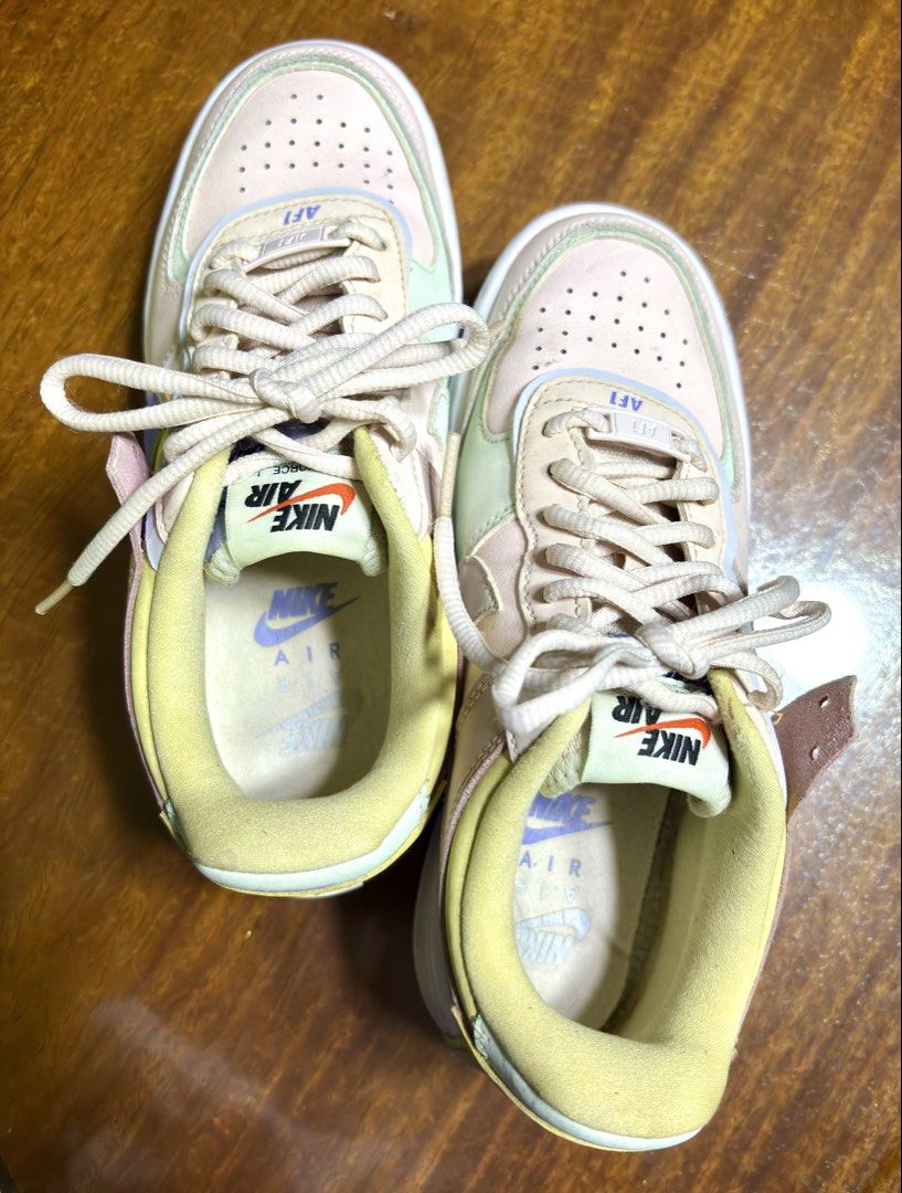 Nike Air Force 1 Shadow Pastel Multi-Color (Category: Sneakers) located in Pasig City. Submitted by hobbesthetiger (Listing ID 1465165268, Image 1). Description: - Brand: Nike Air Force 1 Shadow - Colorway: Pastel tones (light pink base, purple swoosh, yellow collar lining, and green accents) - Design: Chunky stacked sole with standard lacing and AF1 lace dubraes - Style: Casual everyday sneakers with a fun colorblock look - Condition: Gently wor