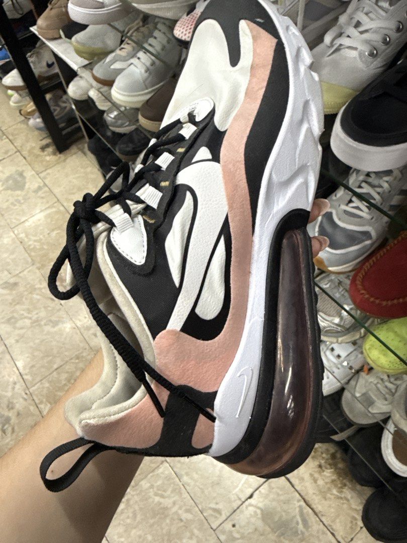 Nike Air Max 270 React White Black Pink (Category: Sneakers) located in Manila. Submitted by fastlion.584bdf (Listing ID 1465069983, Image 1). Description: - Brand: Nike - Model: Air Max 270 React - Colorway: White, black, and pink - Cushioning: Chunky foam midsole with translucent heel air unit - Details: Black laces, back pull tab with small red swoosh - Sole: Durable rubber outsole tread - Condition: Clean upper materials, ready to wear.