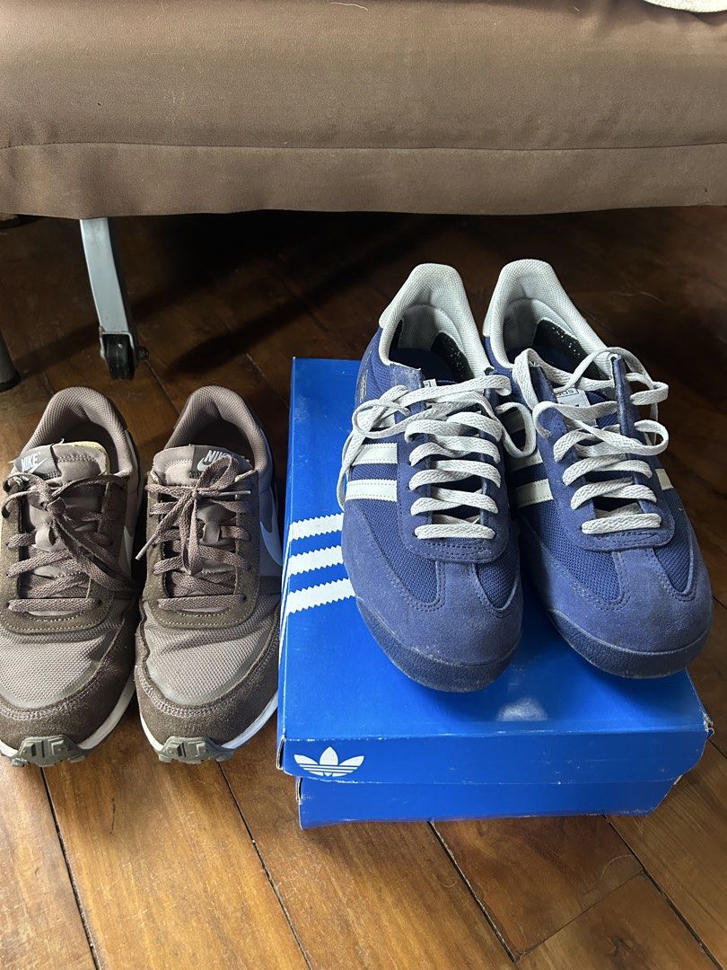 Nike and Adidas Sneakers Bundle (Category: Casual Shoes) located in Caloocan City. Submitted by wise.adrian (Listing ID 1464993513, Image 2). Description: - Bundle of 2 sneakers for daily casual wear - Pair 1: Brown Nike Waffle - Pair 2: Classic blue Adidas R71 - Details: Both feature grey laces and white soles - Condition/Use: Solid rotation for everyday outfits - Selling as a set.