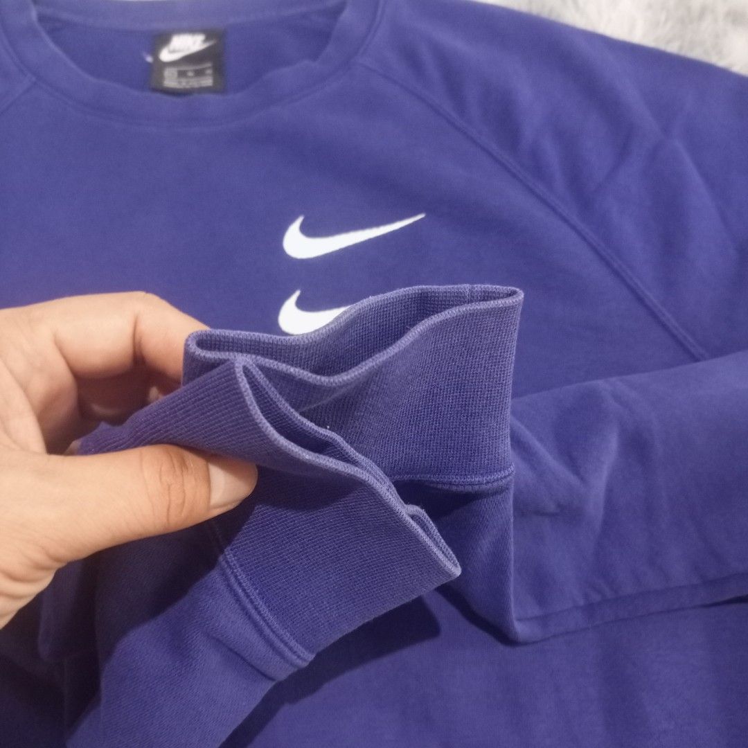 Nike big swoosh jacket (Category: Activewear) located in Cebu City. Submitted by sukitriftshop474747 (Listing ID 1465129445, Image 3). Description: Excellent condition No issue Size XL 23x29 Colorate 9.5/10 Authentic.