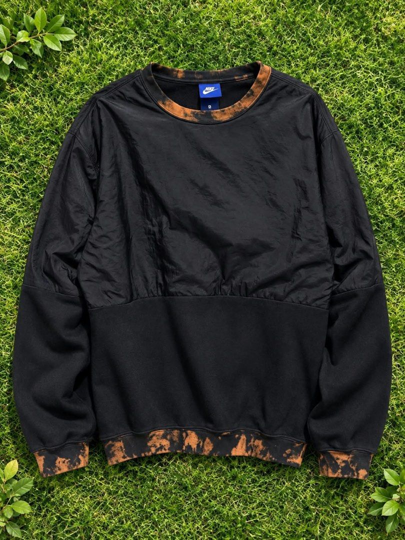 Nike Bleach Wash Sweatshirt (Category: Coats, Jackets and Outerwear) located in Manila. Submitted by zenfox_948652 (Listing ID 1465114329, Image 1). Description: - Brand: Nike - Item: Crewneck Sweatshirt - Color: Black with unique bleached orange wash details - Size: Medium - Design: Paneled nylon upper chest with soft fleece lower body and sleeves - Details: Classic blue Nike label at the inside collar - Condition: Excellent pre-owned condition,