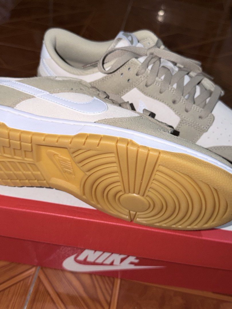 Nike Dunk Low Retro SE (Category: Sneakers) located in Pasay City. Submitted by cartmaxxing (Listing ID 1464975972, Image 3). Description: - Brand: Nike Dunk Low Retro SE - Colorway: Pale Ivory / White - Materials: Suede overlays, leather swoosh, gum rubber outsole - Inclusions: Original red Nike shoebox - Style: Classic court design with versatile neutral earth tones that match any outfit - Condition: Brand new / pristine - Meet-ups only - Bough
