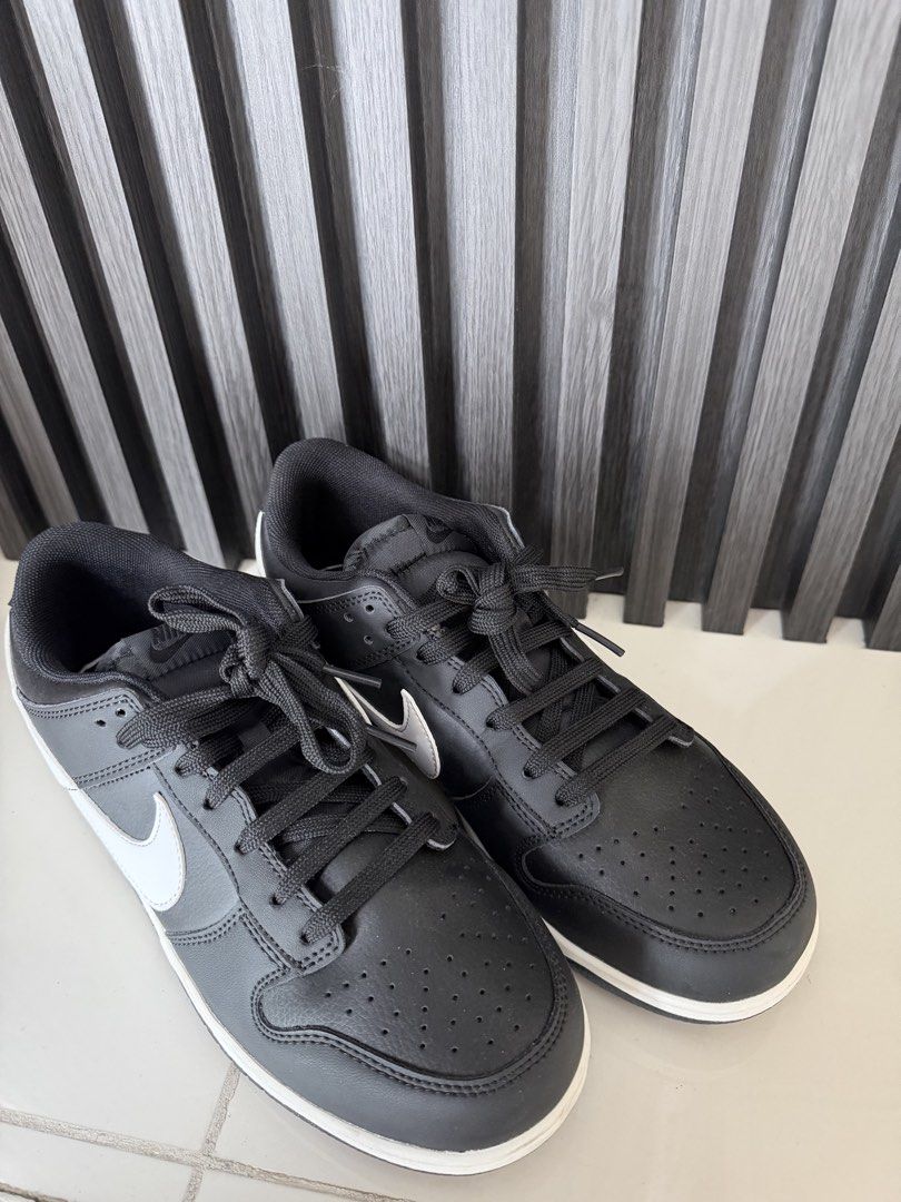 Nike Dunk Low Panda Black White (Category: Sneakers) located in Manila. Submitted by purestar.01 (Listing ID 1465169003, Image 2). Description: - Model: Nike Dunk Low (Classic Panda Colorway) - Color: Black and white with a matching white midsole and swoosh - Material: Durable leather upper and rubber outsole - Condition: Pre-owned with minor dirt on the outsoles from light wear - Style: Classic low-top basketball silhouette - Inclusions: Standar