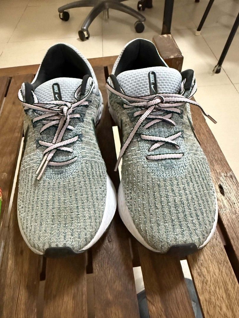 Nike Infinity React Run Women's Running Shoes Size US 7.5 (Category: Sneakers) located in Cabuyao City. Submitted by vastrabbit_07d2c0 (Listing ID 1465055174, Image 1). Description: - Model: Nike Infinity React Run (Style Code: DD3024-300) - Colorway: Grey and blue with vibrant orange heel accent - Size: US 7.5 / UK 5 / EUR 38.5 / 24.5 cm - Origin: Made in Vietnam - Features: Textured knit upper, patterned laces, and plush white cushioned foam so
