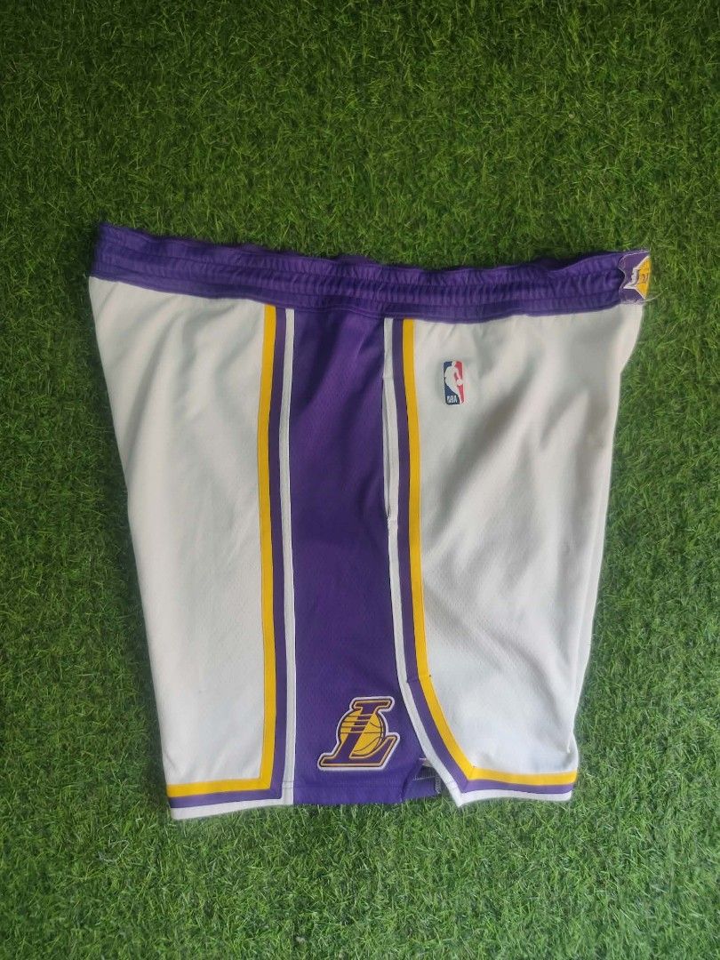 Nike lakers basketball short (Category: Activewear) located in Vinzons. Submitted by kspabico07187 (Listing ID 1465102681, Image 1). Description: Verygood condition Sobrang puti No stain Waist-40-46 L-20.5 Honest issue pinarepair q ung loose stitch s bewang and un swoosh n print wala n.. Kita s pic.