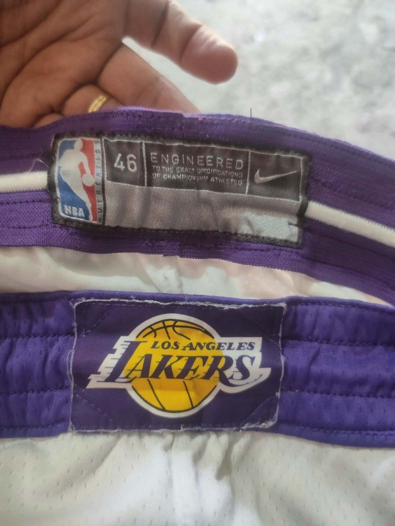 Nike lakers basketball short (Category: Activewear) located in Vinzons. Submitted by kspabico07187 (Listing ID 1465102681, Image 3). Description: Verygood condition Sobrang puti No stain Waist-40-46 L-20.5 Honest issue pinarepair q ung loose stitch s bewang and un swoosh n print wala n.. Kita s pic.