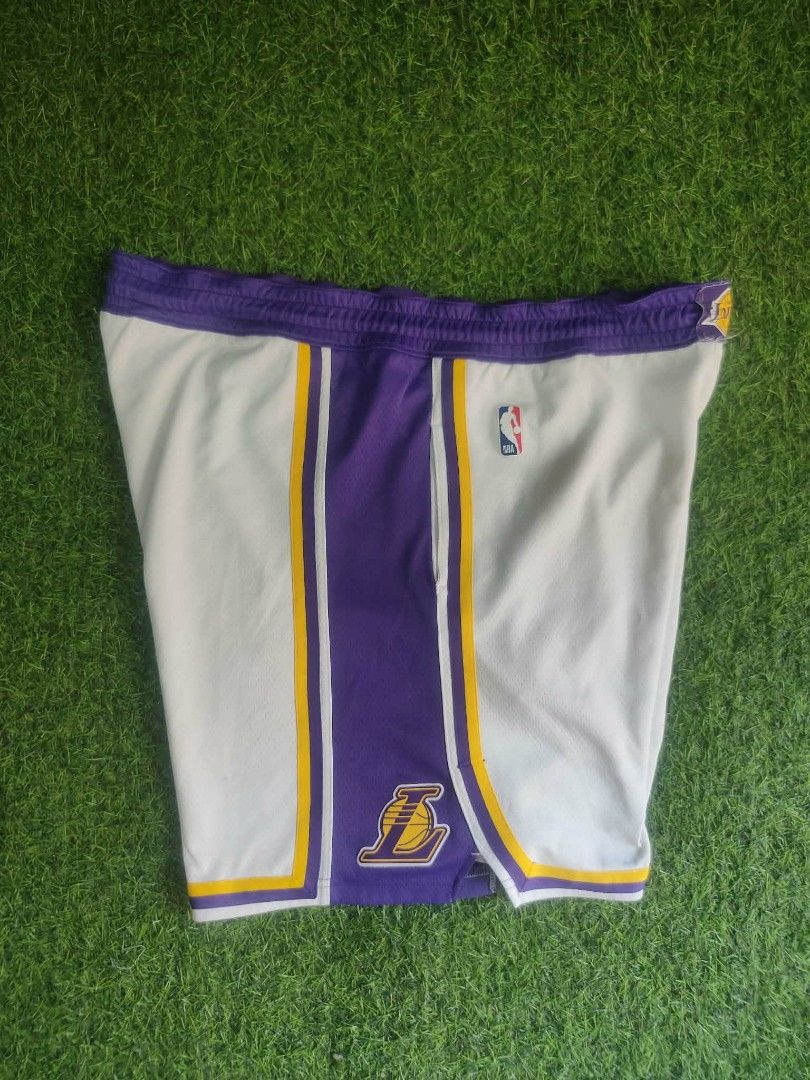 Nike Lakers basketball short (Category: Activewear) located in Vinzons. Submitted by khasanche43622 (Listing ID 1465108521, Image 1). Description: Verygood condition Sobrang puti No stain Waist-40-46 L-20.5 Honest issue pinarepair q Un loose stitch s bewang and Un swoosh n print wla n.