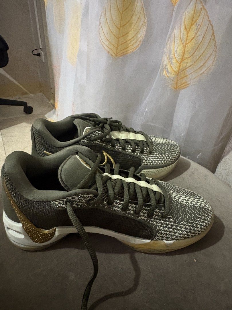 Nike Sabrina 1 “Dedication” (Category: Sneakers) located in Paranaque City. Submitted by wardrobehaven. (Listing ID 1464968936, Image 1). Description: Color: Metallic Green Size: 7.5 Used 3 times for volleyball only. Rfs: not using anymore.