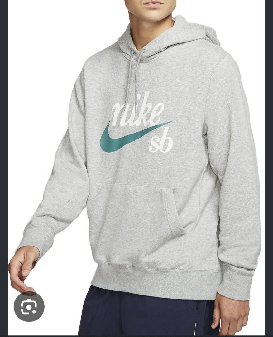 Nike SB White Hoodie Size M (Category: Hoodies) located in Baler. Submitted by jaydeebaltazar (Listing ID 1464985552, Image 1). Description: - Brand/Model: Authentic Nike SB Hoodie - Color: White with teal swoosh and script logo on chest - Size: Medium (tag on collar) - Features: Drawstring hood, front kangaroo pocket, ribbed cuffs and hem, and side seam woven label - Origin: Made in Malaysia - Condition: Clean piece, extremely comfortable for da