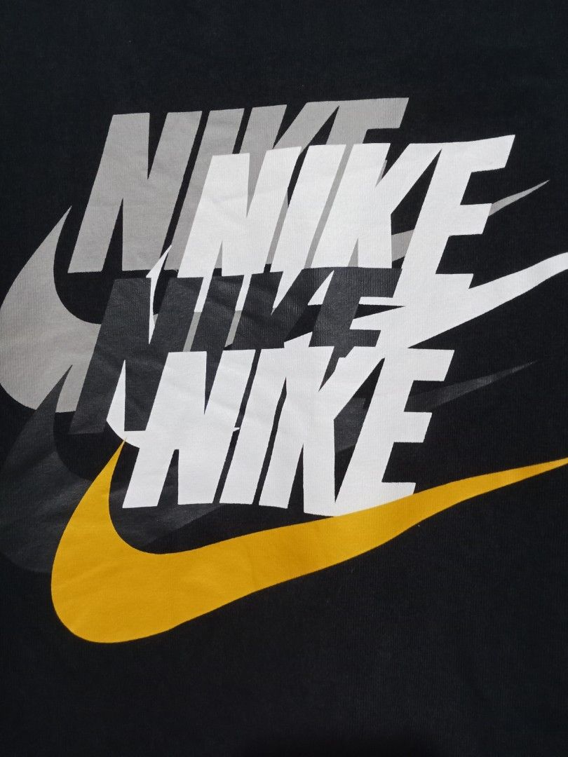 Nike Stacked Logo Graphic Tee Black (Category: Tshirts & Polo Shirts ) located in Manila. Submitted by okellorrai95403 (Listing ID 1465083850, Image 2). Description: - Brand: Nike (The Nike Tee line) - Color: Black with multi-color stacked chest print - Fit: Regular, classic crew neck, short sleeves - Measurements (Flat Lay): Width ~21 inches, Length ~29 inches - Condition: Clean and in great everyday wear condition.