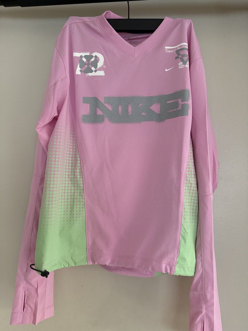 Nike swift running top (Category: Activewear) located in Manila. Submitted by v2024 (Listing ID 1464994454, Image 2). Description: Small.