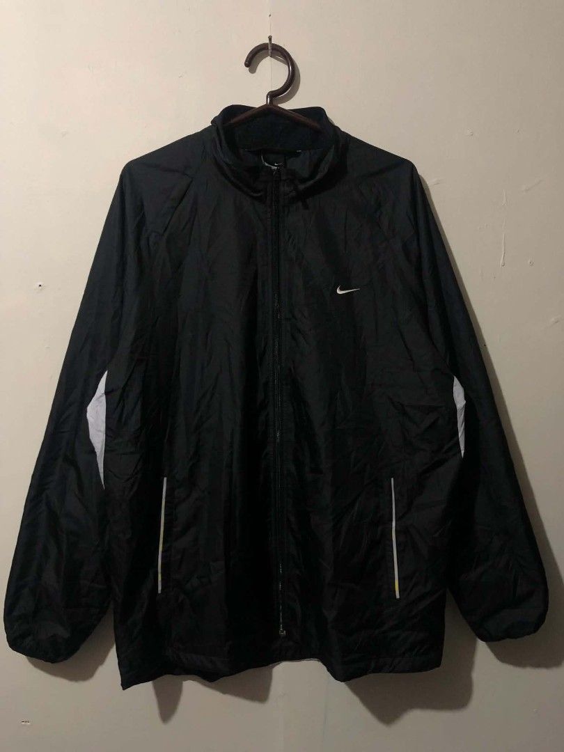 Nike Vintage Windbreaker (Category: Coats, Jackets and Outerwear) located in Pasig City. Submitted by geloangelo17550 (Listing ID 1465152101, Image 1). Description: Authentic With tags Excellent condition 25 width 31 length issue - natanggal na yung yellow lining na design check last picture / medyo tumigas both pocket zip need lang ng langis.