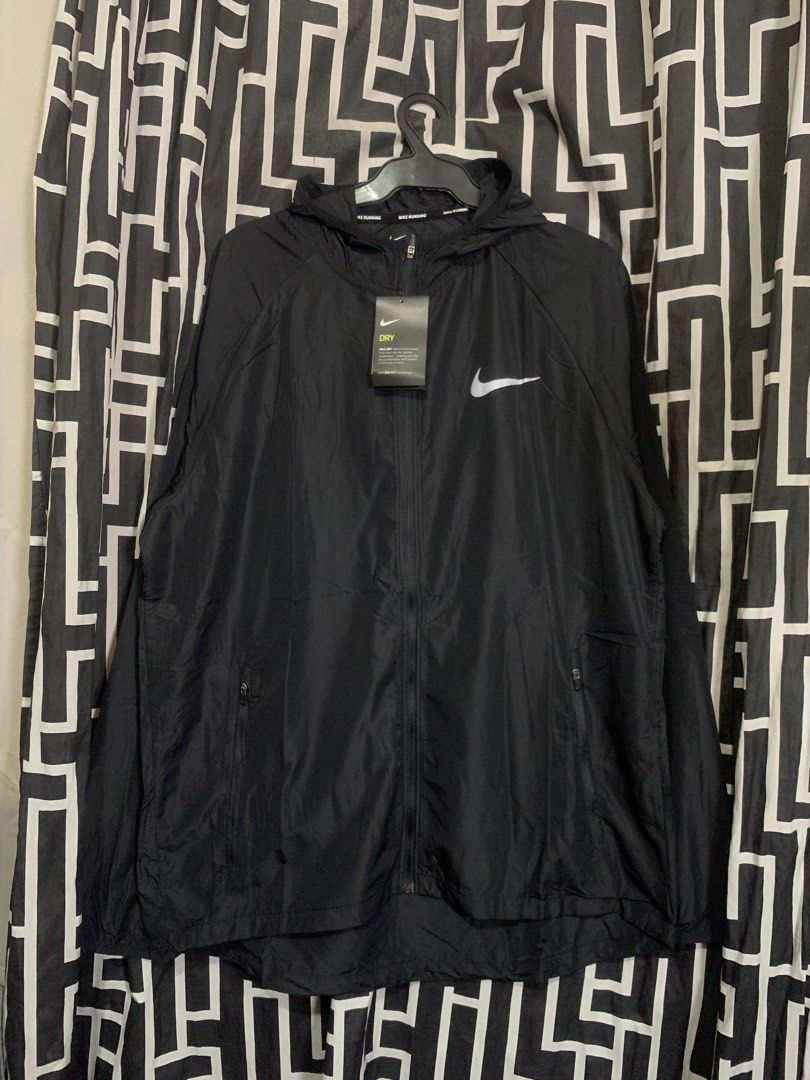 Nike windbreaker (Category: Activewear) located in Manila. Submitted by bibiies2.0xghettothrift (Listing ID 1465044375, Image 1). Description: Mine 1200 Details W23 L28 Xxl on tag fit to large loc. baclaran parañaque.
