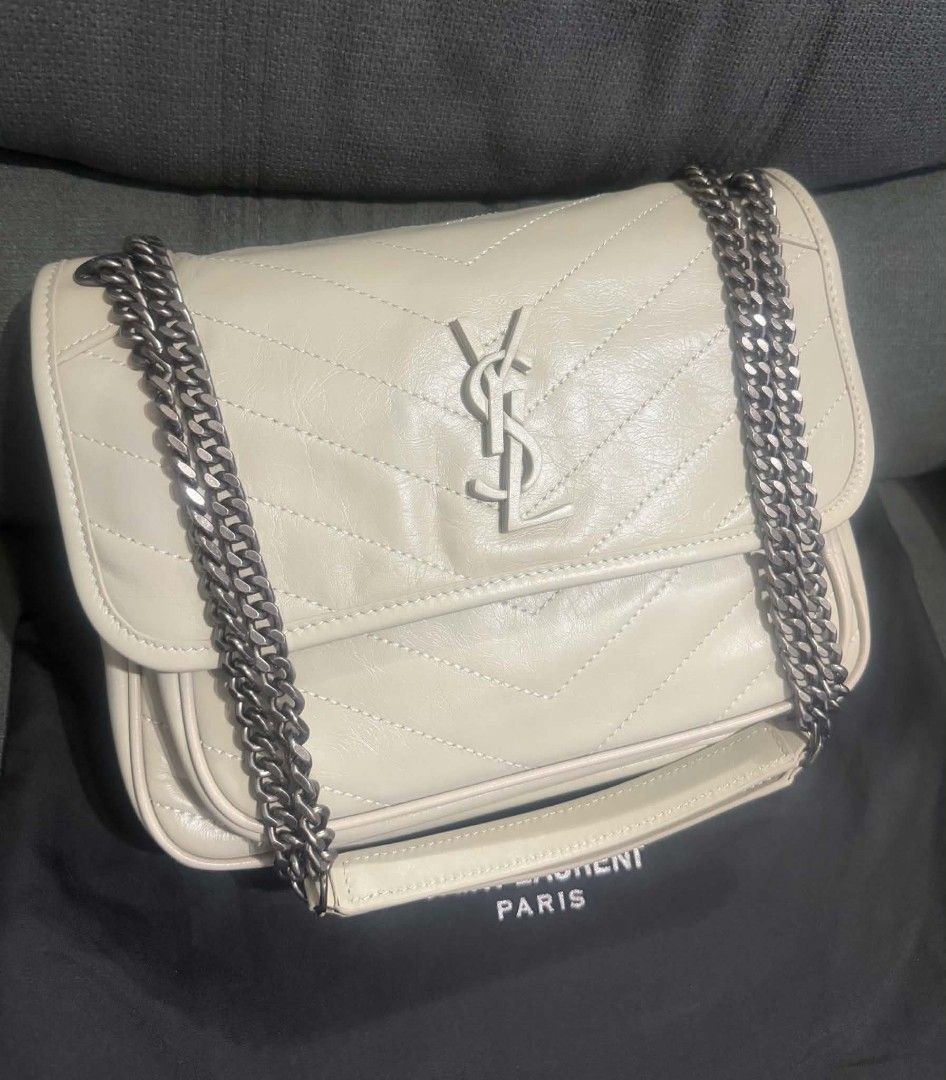Niki Large (Category: Shoulder Bags) located in Quezon City. Submitted by luxxechic (Listing ID 1464996784, Image 1). Description: coded pure leather with dust bag gpod as new no issue japan prelo ed actual photo posted mop: gcash.
