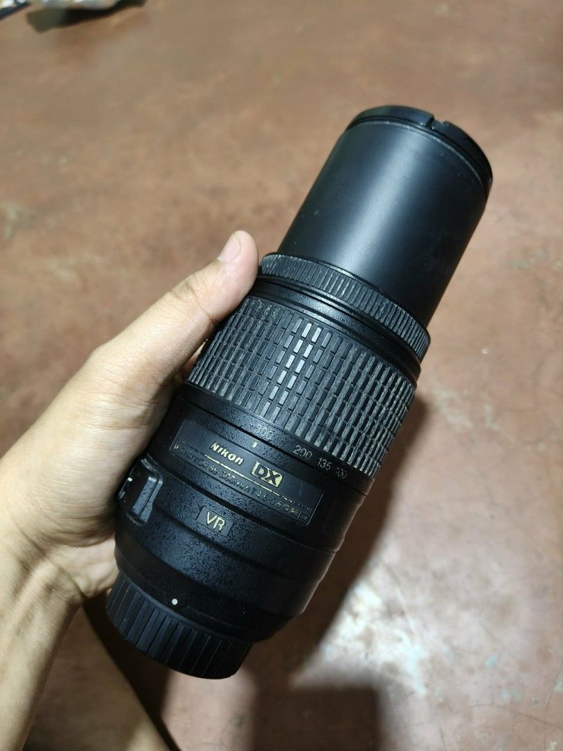Nikon 55-300mm VR DX (Category: Lens & Kits) located in Caloocan City. Submitted by mr.carlo_dslr_laptop (Listing ID 1465051016, Image 3). Description: Nikon 55-300mm VR Telephoto Lens Af-S mount F mount 5,000 only Rush My fungus lang sa glass Di naman sya nakaka Labo Blur ng image Goods po performance at Outputs Fadings sa Logos and Lettering markings 5k Cash Pick Up Monumento Caloocan 5k Working Autofocus Working Manualfocus Working VR stabiliz