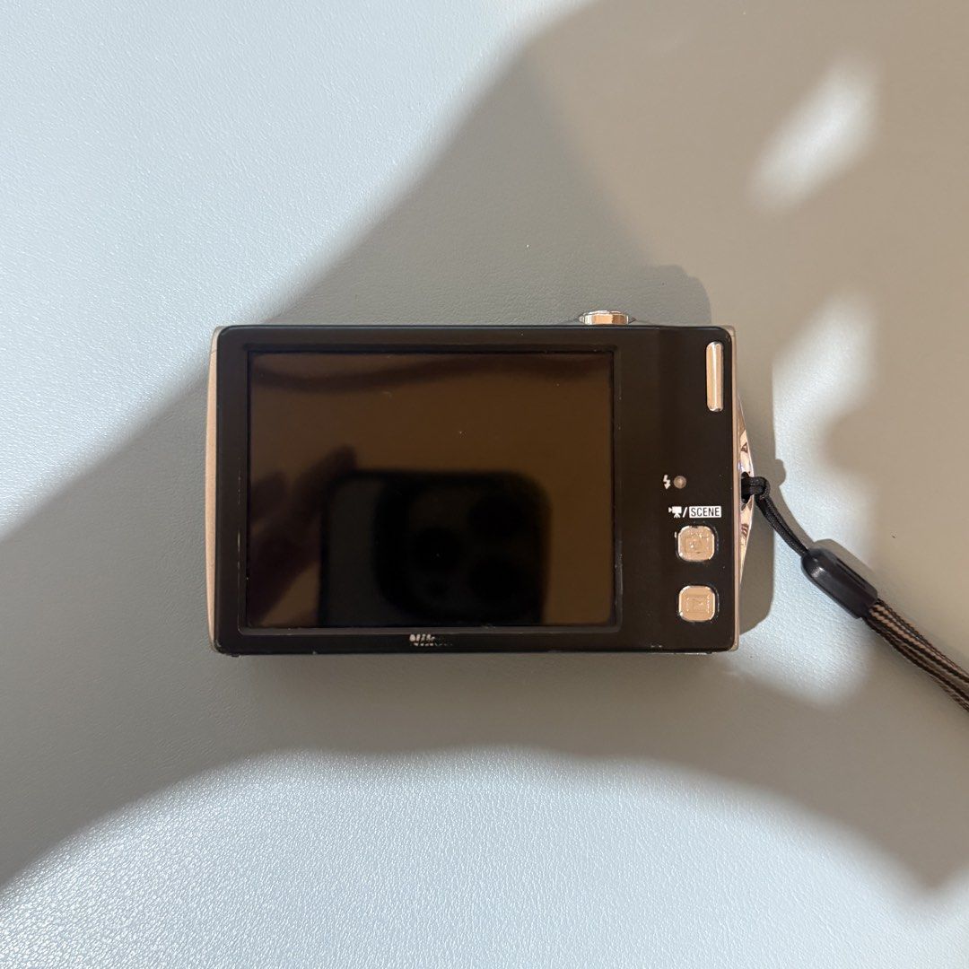 Nikon Coolpix S4000 Digital Camera (Category: Cameras) located in Paranaque City. Submitted by veniceayado (Listing ID 1465075833, Image 1). Description: NIKON COOLPIX S4000 12 MP 4x Optical Zoom Touch screen 2500 + SF 🪷 Inclusions: - Unit - Battery - Memory Card - Universal Charger - Strap 🪷 Issues: - slighty hard touch but very manageable! - no port cover - signs of usage - may be hard to focus on subject sometimes. output becomes slightly bl