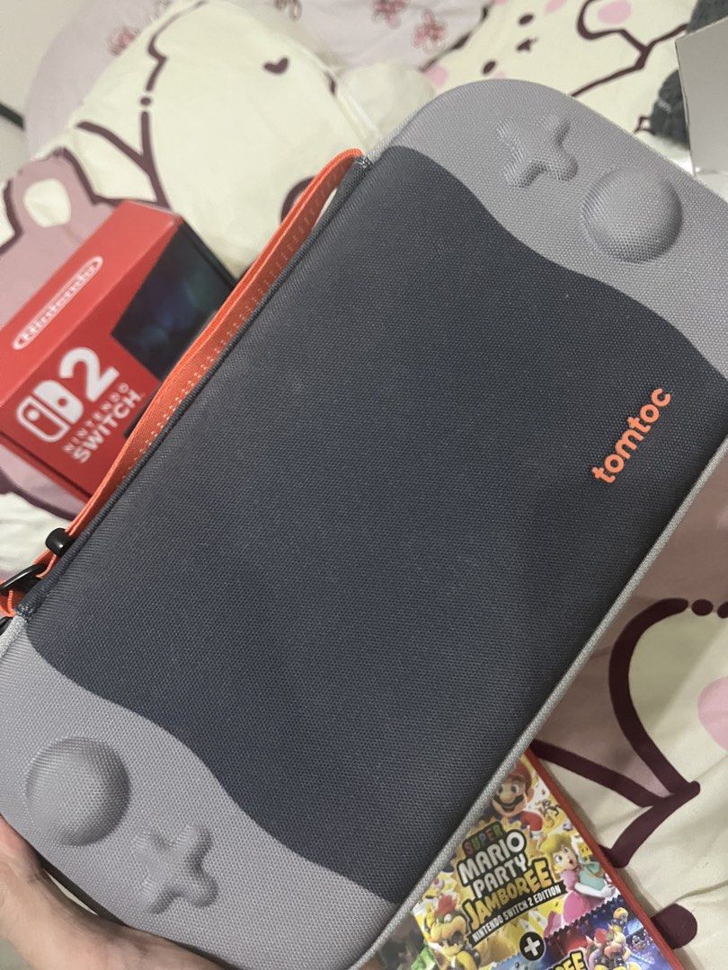 NINTENDO SWITCH 2 (Category: Nintendo) located in Cebu City. Submitted by azuline (Listing ID 1465099419, Image 3). Description: NINTENDO SWITCH 2 NO ISSUE!! 9.9/10 CONDITION w/ receipt (DOP: June 2026) w/ box, complete inclusions w/ screen protector w/ thumb stick caps w/ hard case bag FREEBIES: MARIO JAMBOREE SWITCH2 EDITION & LUIGI’S MANSION 3 P28,000 .