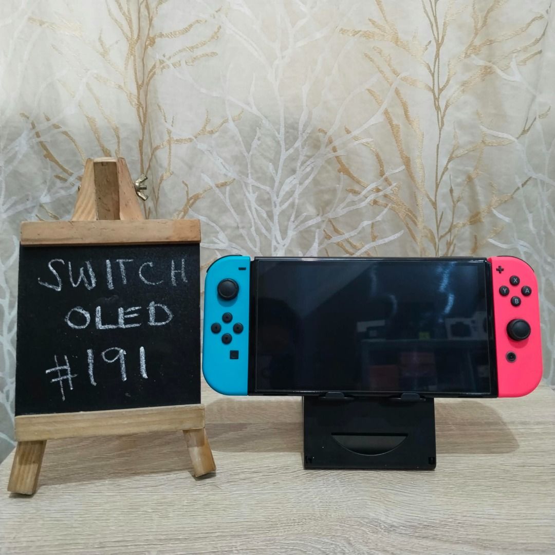 Nintendo Switch OLED Neon Super Fresh pa! (Category: Nintendo) located in Paranaque City. Submitted by thebiskwitcompany (Listing ID 1464995068, Image 2). Description: #191 Nintendo Switch Oled P10995 -Box, Unit, Charger, Joycons, Joycon Strap, Joycon Grip, Dock, HMDI -No Issue (buttons, analog, eshop, micro sd card reader, wifi etc) -with tempered glass since day 1 -like new and super fresh pa! Shipping through Lalamove, Grab, JNT, LBC (COD/COP)