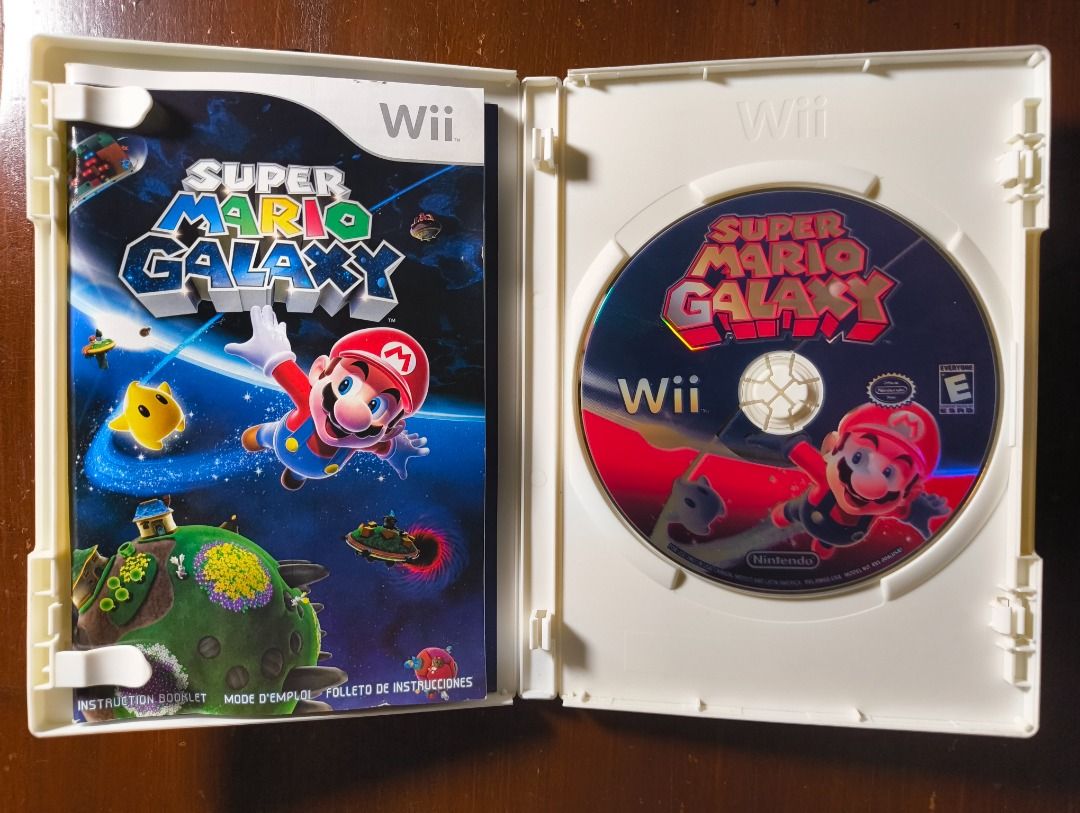 Nintendo Wii Games Bundle Super Mario Galaxy Smash Bros Brawl (Category: Nintendo) located in Paranaque City. Submitted by vall03 (Listing ID 1465052438, Image 2). Description: Wii Games Bundle - Games Included: Super Mario Galaxy and Super Smash Bros Brawl - Condition: Complete with original cases, and manuals - Discs not tested since I don't have access to a Wii - All games are US region *Sold as BUNDLE ONLY *Price is negotiable.