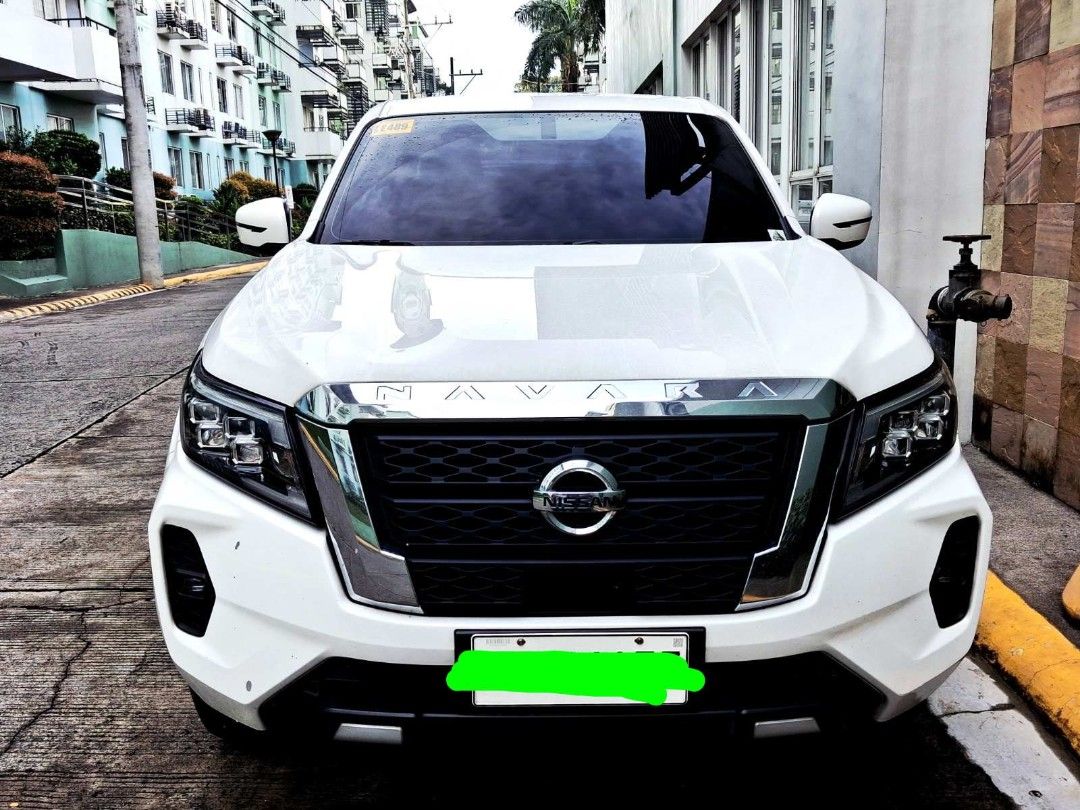 Nissan Navara VE 4x2 Auto (Category: Used Cars) located in Quezon City. Submitted by dlsb7 (Listing ID 1464978190, Image 1). Description: 2.5L, 4x2 April 2022 First owner REVOLVER bed cover Deep dish matting Comprehensive insurance w/AOG up to April 2027 Some minor dents/scratches Casa-maintained, just finished 40k PMS 1st owner No accident, never flooded Basement, covered parking RFS - moving to smaller vehicle Direct buyer encouraged.