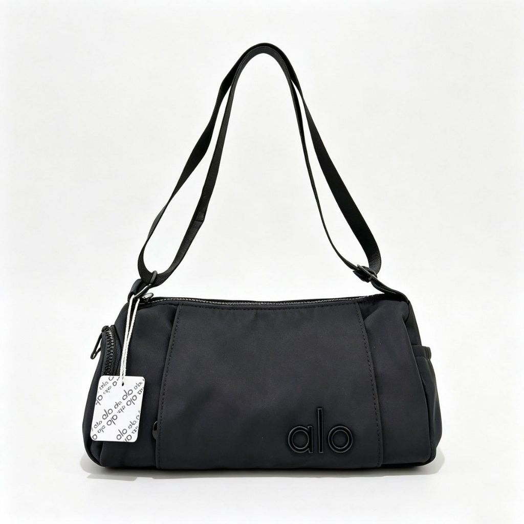 Nylon Shoulder/Crossbody Bag (Category: Shoulder Bags) located in Davao. Submitted by nisa_chan04 (Listing ID 1465101217, Image 3). Description: - Brand new shoulder/crossbodybag - Available in multiple colors - Made from smooth nylon fabric with structured paneling - Features raised rubber logo lettering on the front - Secure zippered top closure and convenient exterior side pocket - Comfortable adjustable shoulder strap - Comes with branded tag