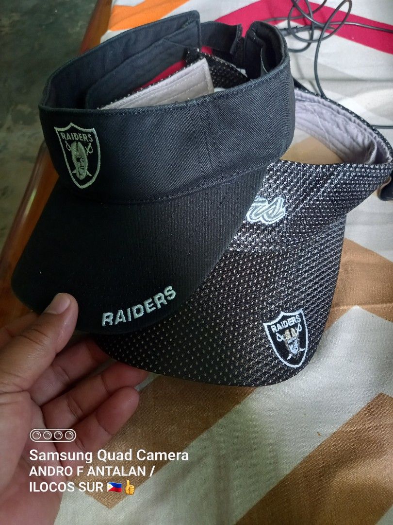 Oakland Raiders NFL Drew Pearson Visor Cap (Category: Caps & Hats) located in Narvacan. Submitted by drexantala78144 (Listing ID 1464984111, Image 1). Description: - Authentic Oakland Raiders sports visor by game day - Classic black color with stylish mesh detail - Embroidered team logo on the front and back strap - Adjustable hook-and-loop closure (One Size Fits All) - Easy care: hand wash cold - Great fan gear for game days and everyday wear.