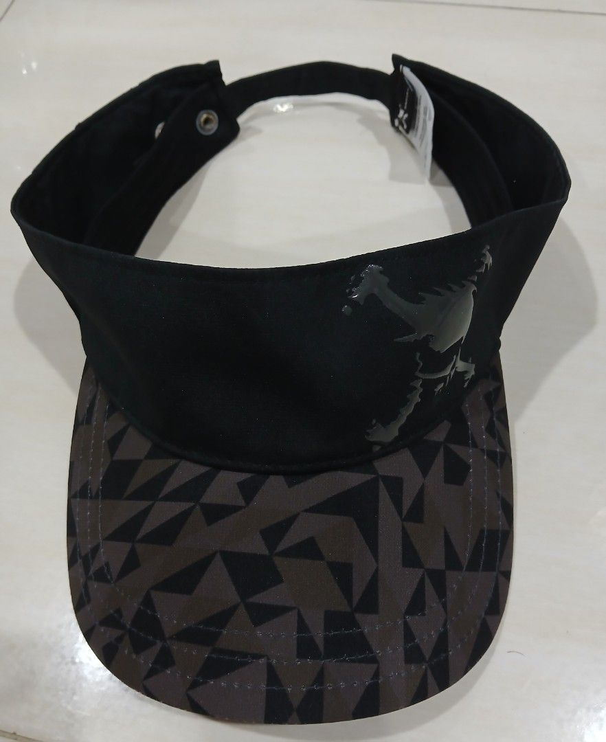Oakley Black and Geometric Visor Hat (Category: Caps & Hats) located in Plaridel. Submitted by igieperez147282 (Listing ID 1465079682, Image 2). Description: - Color: Sleek black with a trendy geometric pattern on the brim - Closure: Adjustable gold-tone buckle strap for a custom fit - Material: 100% durable polyester - Condition: Brand new / Excellent quality - Perfect for daily casual wear, outdoor activities, and streetwear style.