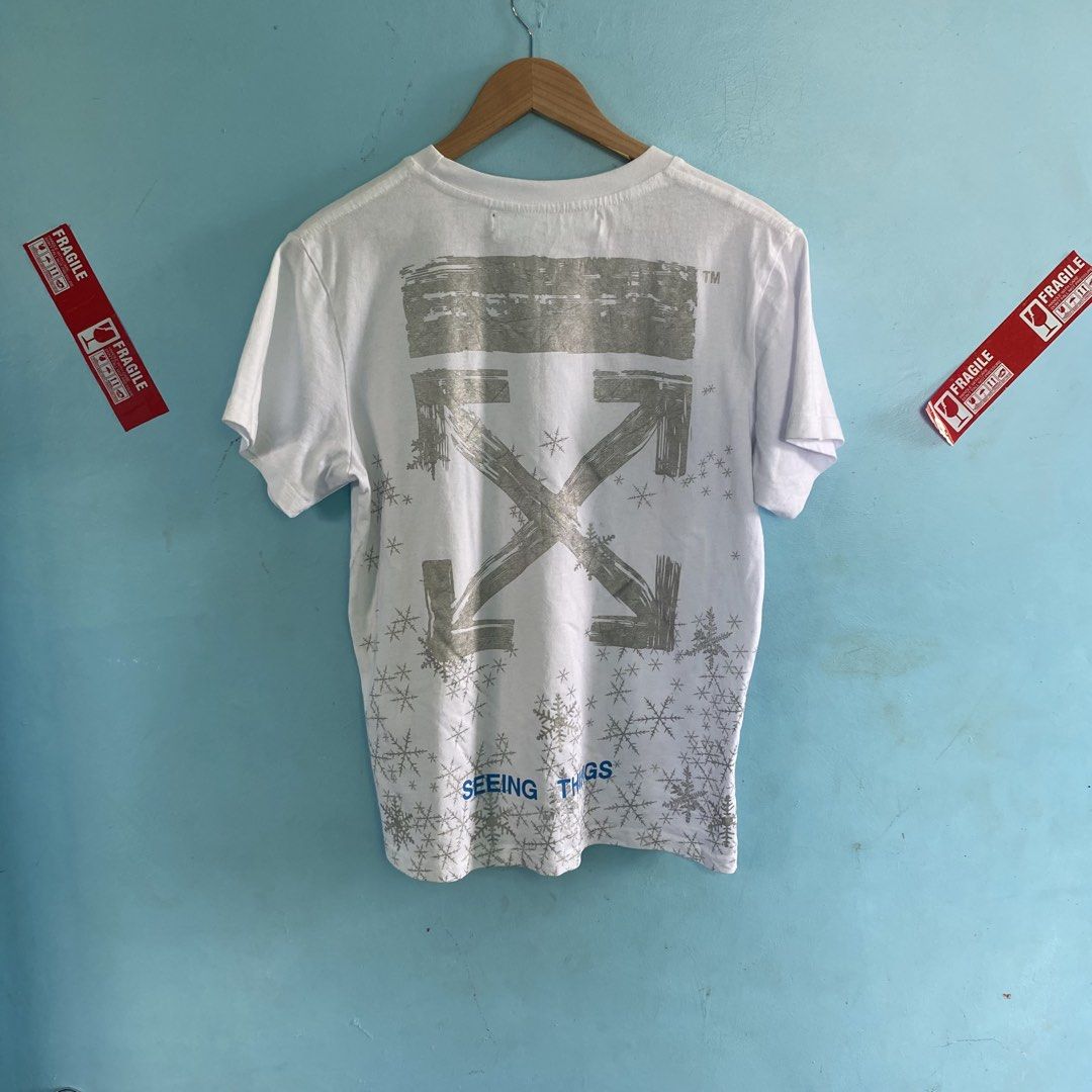 Off white snowflakes shirt (Category: Tshirts & Polo Shirts ) located in Santo Tomas. Submitted by niftynook_22 (Listing ID 1465015572, Image 2). Description: Excellent condition 9/10 color rate 20x26 No issue.