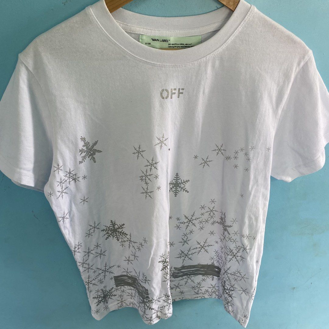 Off white snowflakes shirt (Category: Tshirts & Polo Shirts ) located in Santo Tomas. Submitted by niftynook_22 (Listing ID 1465015572, Image 3). Description: Excellent condition 9/10 color rate 20x26 No issue.