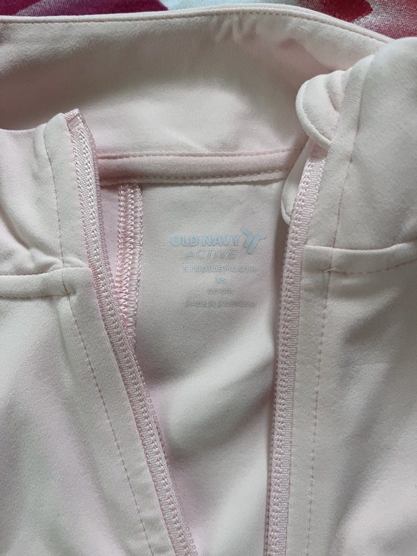 Old Navy Active StudioSmooth Full-Zip Jacket Pink XS (Category: Coats, Jackets and Outerwear) located in Manila. Submitted by oddstorm_9d6c74 (Listing ID 1465016025, Image 2). Description: - Brand: Old Navy Active - Condition: Brand new with original retail tags - Color: Pink - Size: Extra Small (XS) - Fabric: StudioSmooth with Go-Dry moisture-wicking technology - Features: Full-zip front, high collar, and long sleeves with thumbholes.