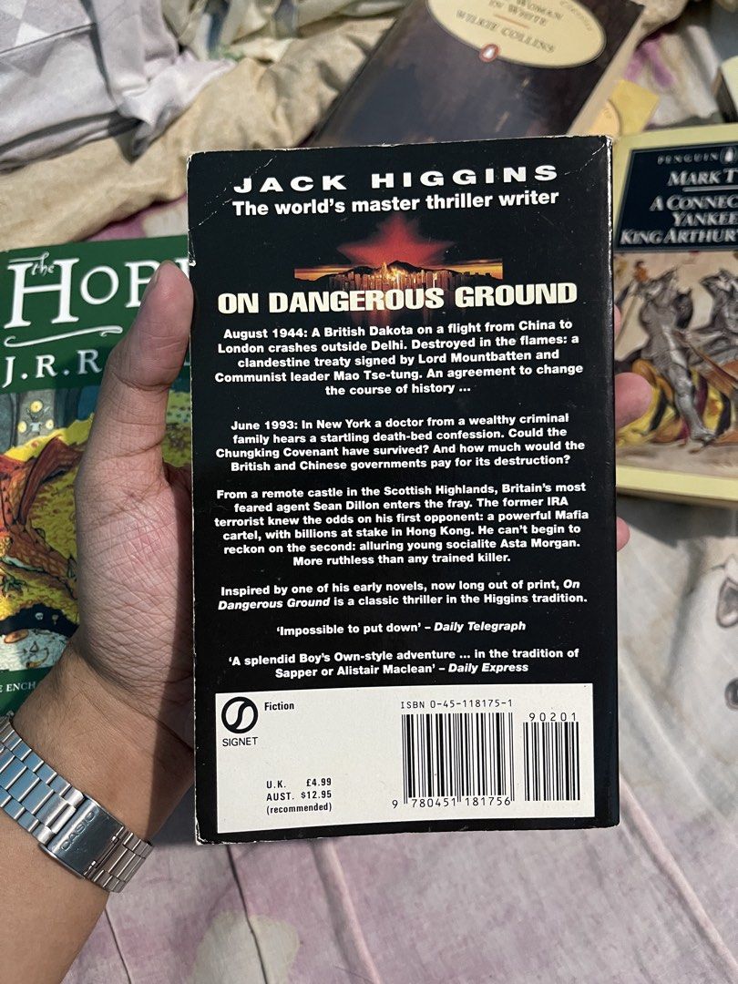 On Dangerous Ground by Jack Higgins Paperback Novel (Category: Storybooks) located in Bulacan. Submitted by keen72811 (Listing ID 1465098956, Image 3). Description: - Title: On Dangerous Ground by Jack Higgins - Genre: Political thriller and suspense fiction (Features Sean Dillon) - Format: Signet mass market paperback (ISBN: 0-45-118175-1) - Condition: Pre-loved with vintage page yellowing and minor cover edge wear - Perfect for: Thriller fans l