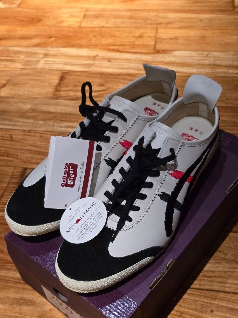 Onitsuka Tiger Nippon Made Mexico 66 Deluxe (Category: Casual Shoes) located in Quezon City. Submitted by RSTRS (Listing ID 1465005210, Image 3). Description: - Brand: Onitsuka Tiger Nippon Made Mexico 66 Deluxe - Condition: Brand new, never worn, pristine condition - Material/Design: Premium white leather upper, black suede overlays, and striking black & red brushstroke stripes - Origin: Expertly crafted in Japan - Inclusions: Comes with origina