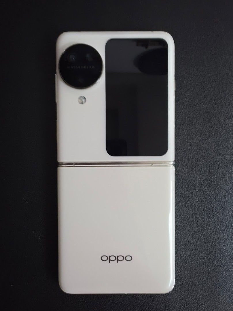 Oppo Find N3 Flip (Category: OPPO) located in Baguio. Submitted by wildtree.e82109 (Listing ID 1465108104, Image 1). Description: - Brand/Model: Oppo Find N3 Flip - Color: White - Storage: 256GB - Condition: 3/5 (Pre-loved with minor cosmetic wear on the hinge and frame edges as shown in photos) - Key Features: Compact foldable design, large cover display, Hasselblad camera setup - No charger. With orig box. - Got it from Globe - Meetup Location: