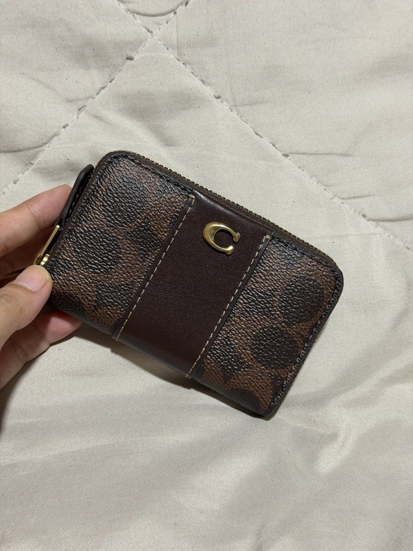 Original Coach Essential Small Zip Around Card Case (Category: Wallets & Card holders) located in Marikina City. Submitted by welllovedbycarina (Listing ID 1465144508, Image 2). Description: 🍁 Guaranteed original Coach 🍁 Maple color 🍁 Used for less than 1 week 🍁 With tiny unnoticeable hair lines lang sa C logo 🍁 Can pass as brand new! No issues sa leather 🍁 With original tag and care card 🍁 No paper bag, no box 🍁 RFS: Hindi po kasya ang c