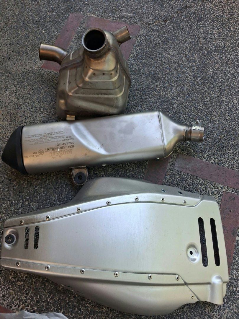 ORIGINAL DUCATI DESERT X (Category: Mufflers and Exhaust Parts and Accessories) located in Manila. Submitted by rthllareign (Listing ID 1465077326, Image 3). Description: ORIGINAL DUCATI DESSERT X FOR SALE Ducati Desert X Parts Good as new, BRANDNEW walang basag, walang bengkong. BAGONG BAGO PA!!! ✨Exhaust Silencer ✨Silver Aluminum OEM Skid Plate / Engine Bash Plate ✨Hand Guards Pair ✨Muffler PM lang, negotiable!!! MAY BAWAS PA SA SURE BUYER!!! P