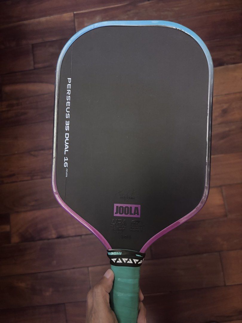 Original Joola Perseus 3S (Category: Racket and Ball Sports) located in Quezon City. Submitted by moptop22 (Listing ID 1465058334, Image 1). Description: Has scratches on the head but comes with edge tape NOTE !!! I removed the original grip for better feel. There’s only the overgrip around the handle. .