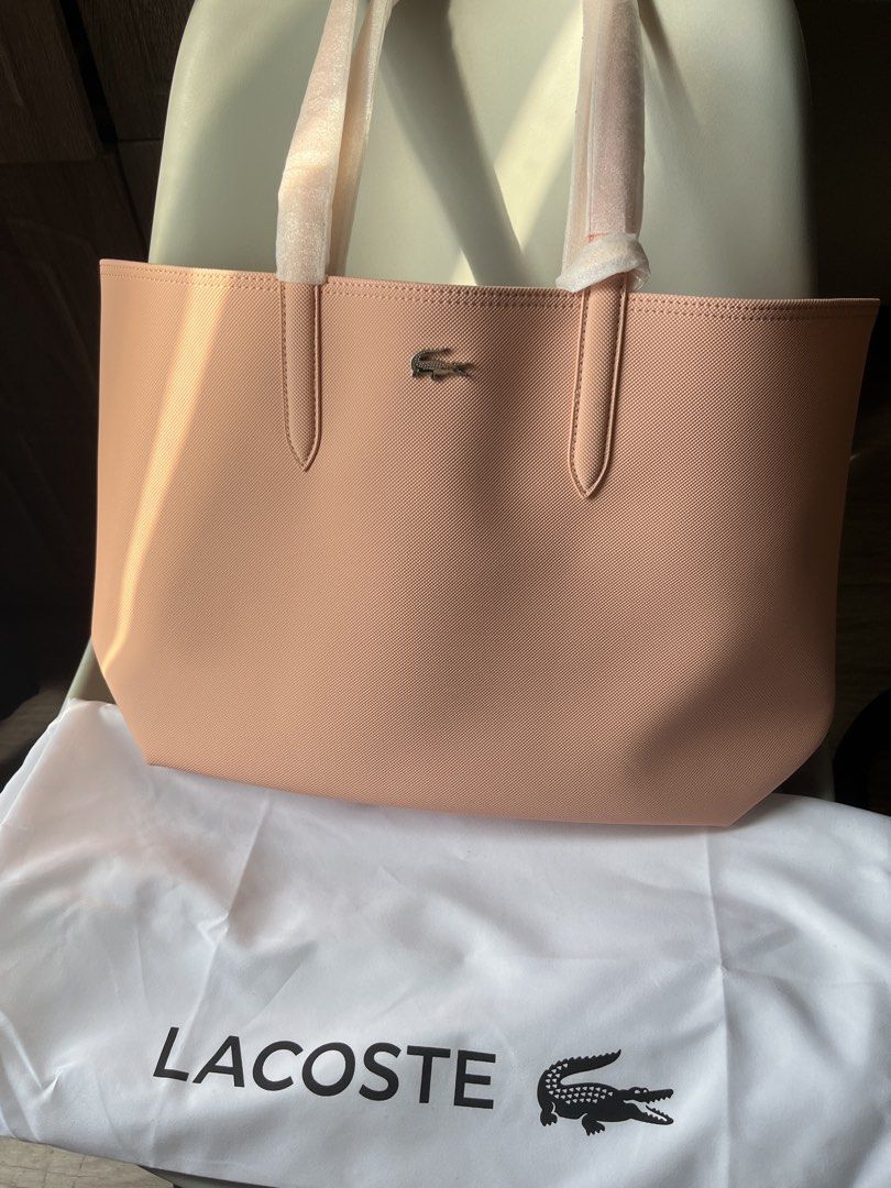 Original Lacoste Reversible Tote Bag (Category: Tote Bags) located in Manila. Submitted by katelee16 (Listing ID 1465027660, Image 3). Description: Brandnew! I already removed the tags. Color is Miami Angiefrom lacoste.