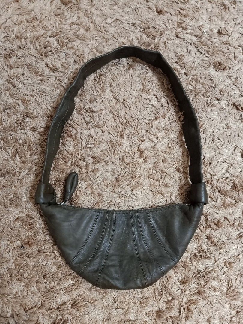 Original Lemaire croissant small leather bag (Category: Cross-body Bags) located in Binmaley. Submitted by fashionluxury058 (Listing ID 1465080563, Image 1). Description: original lemaire croissant small leather bag in very good condition size small genuine leather color army green unisex.