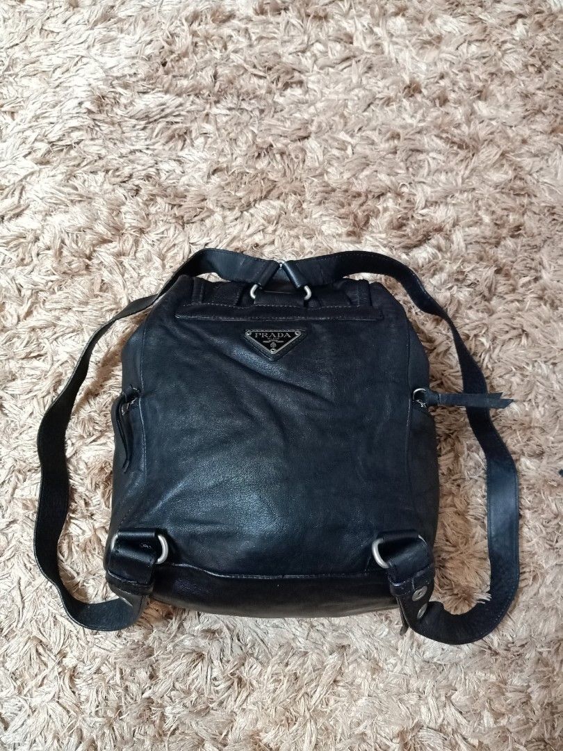 Original prada leather backpack (Category: Backpacks) located in Binmaley. Submitted by fashionluxury058 (Listing ID 1465078993, Image 1). Description: original prada leather backpack in very good condition size: small to medium genuine leather color black unisex.