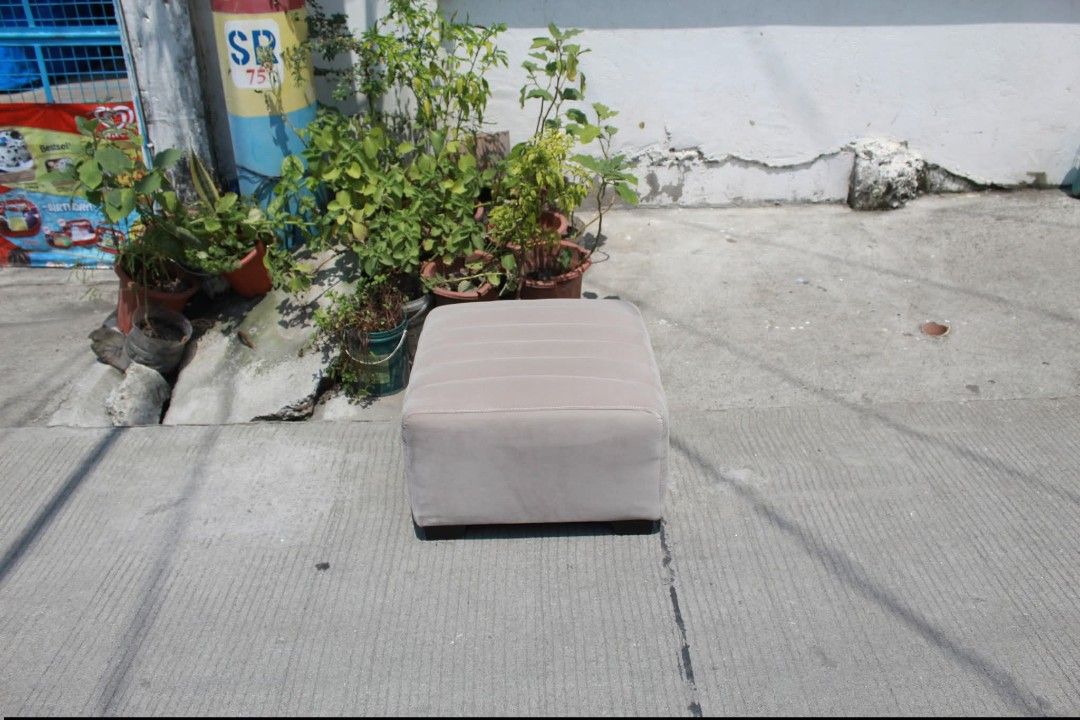 Ottoman (Category: Other Home Furniture) located in Meycauayan. Submitted by marygracecasimiro (Listing ID 1465164401, Image 3). Description: Modern Channel-Tufted Ottoman Soft gamuza upholstery with vertical channel tufting and a sleek low-profile black base. Perfect as a footstool, extra seating or stylish accent piece L:22 • W:21 • H:13 inches 3,500 pesos only🩷🧡.